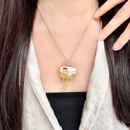 CHANEL 26S DOUBLE C LOGO MINI VANITY BAG PENDANT NECKLACE WITH STAR CHARM IN GOLD METAL 633291