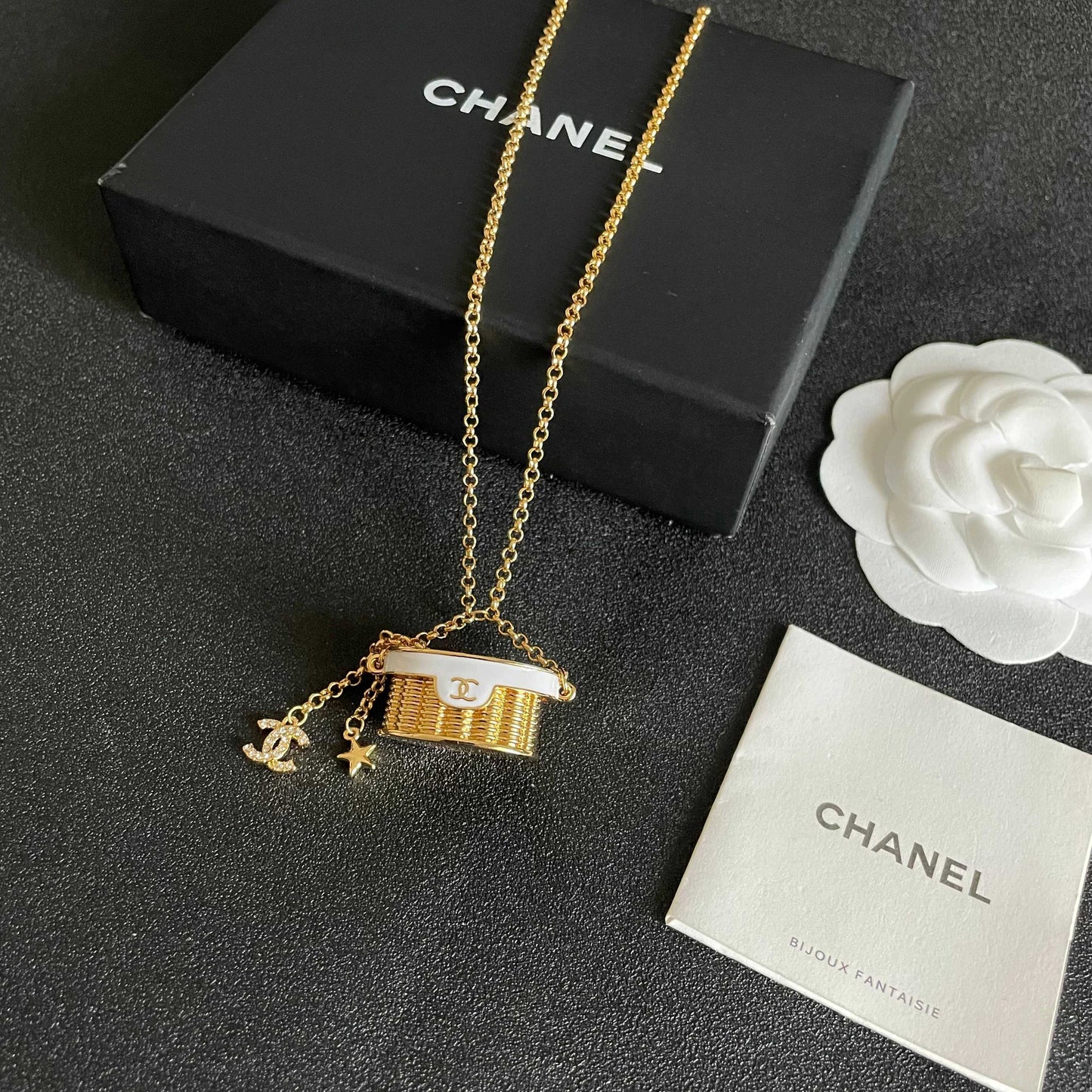 CHANEL 26S DOUBLE C LOGO MINI VANITY BAG PENDANT NECKLACE WITH STAR CHARM IN GOLD METAL 633291