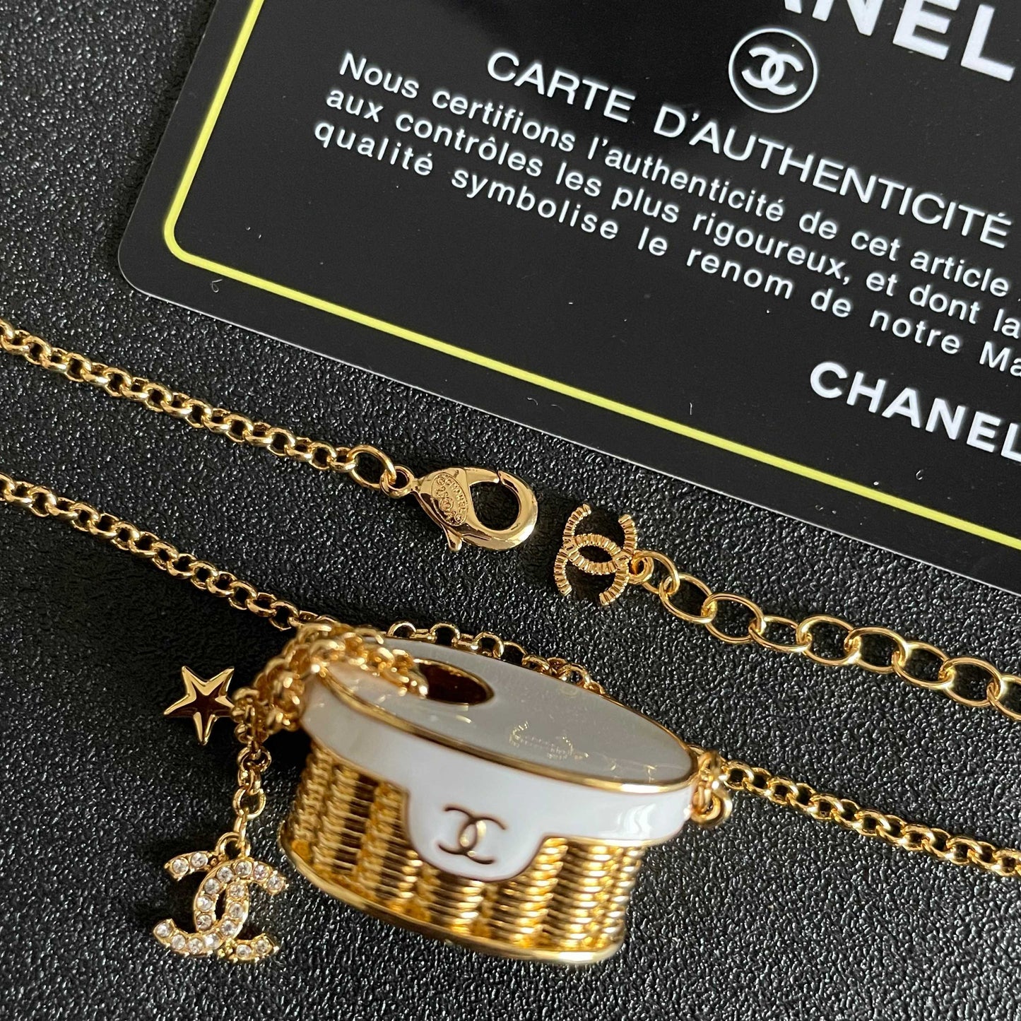 CHANEL 26S DOUBLE C LOGO MINI VANITY BAG PENDANT NECKLACE WITH STAR CHARM IN GOLD METAL 633291