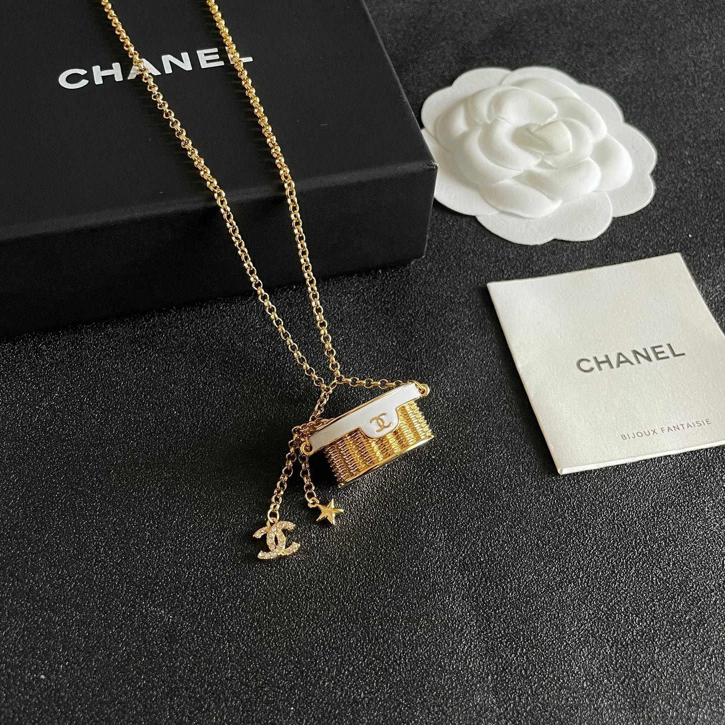 CHANEL 26S DOUBLE C LOGO MINI VANITY BAG PENDANT NECKLACE WITH STAR CHARM IN GOLD METAL 633291