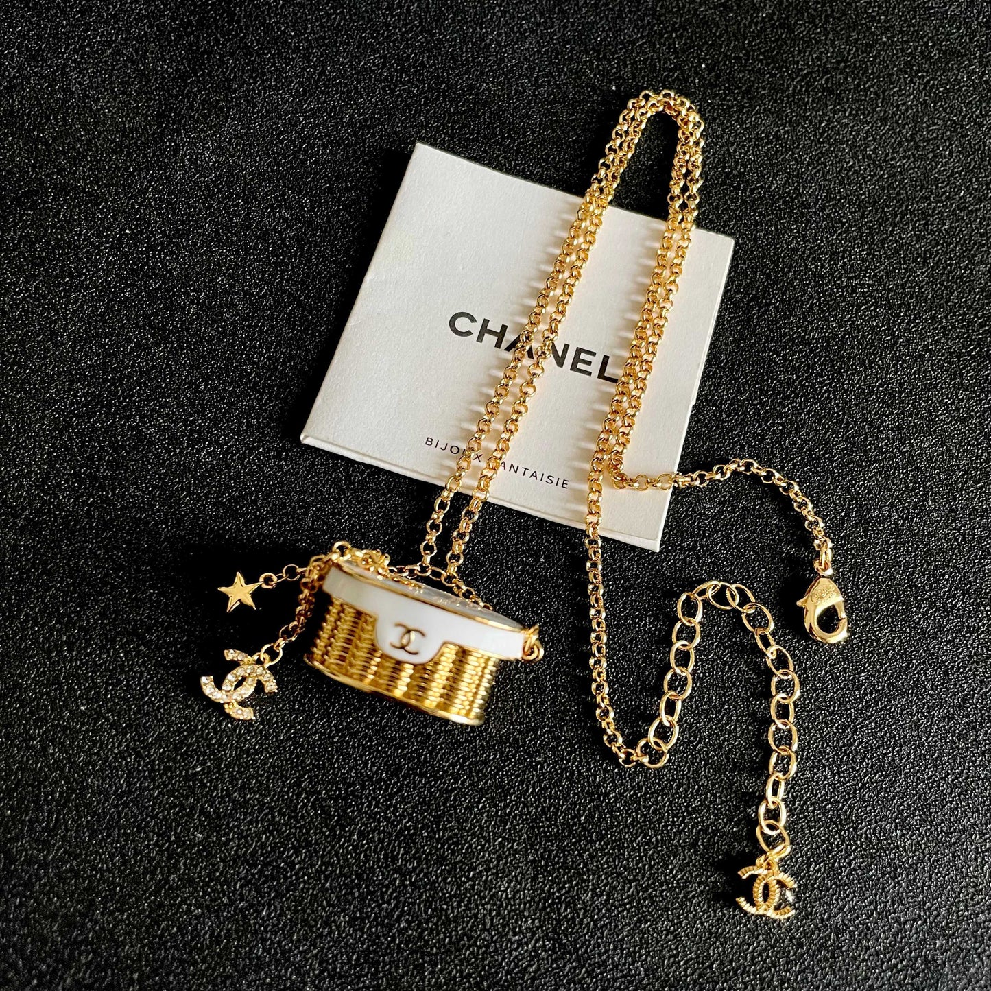CHANEL 26S DOUBLE C LOGO MINI VANITY BAG PENDANT NECKLACE WITH STAR CHARM IN GOLD METAL 633291
