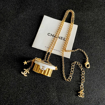 CHANEL 26S DOUBLE C LOGO MINI VANITY BAG PENDANT NECKLACE WITH STAR CHARM IN GOLD METAL 633291