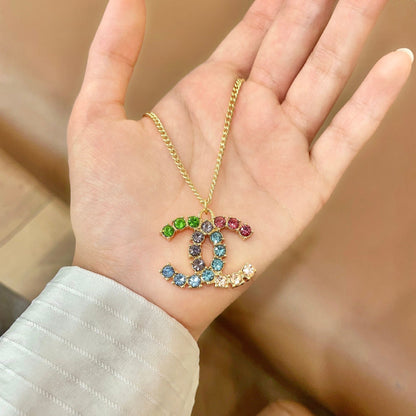 CHANEL 26S DOUBLE C LOGO MULTICOLOR CRYSTAL STATEMENT PENDANT NECKLACE IN GOLD METAL 633295