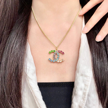 CHANEL 26S DOUBLE C LOGO MULTICOLOR CRYSTAL STATEMENT PENDANT NECKLACE IN GOLD METAL 633295