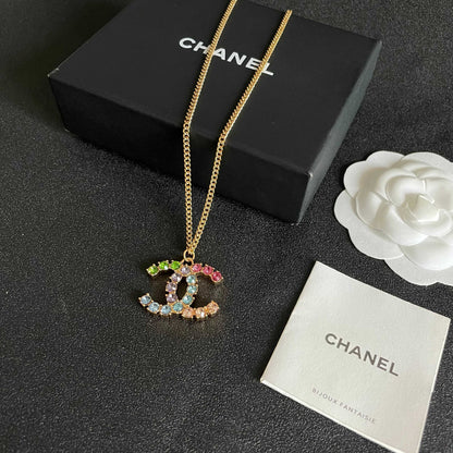 CHANEL 26S DOUBLE C LOGO MULTICOLOR CRYSTAL STATEMENT PENDANT NECKLACE IN GOLD METAL 633295