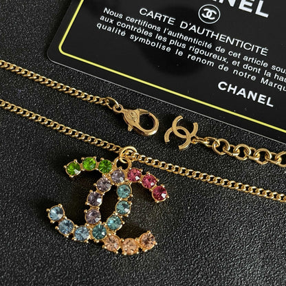 CHANEL 26S DOUBLE C LOGO MULTICOLOR CRYSTAL STATEMENT PENDANT NECKLACE IN GOLD METAL 633295
