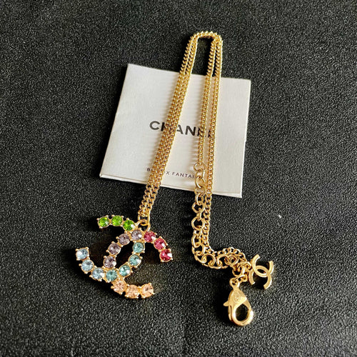 CHANEL 26S DOUBLE C LOGO MULTICOLOR CRYSTAL STATEMENT PENDANT NECKLACE IN GOLD METAL 633295