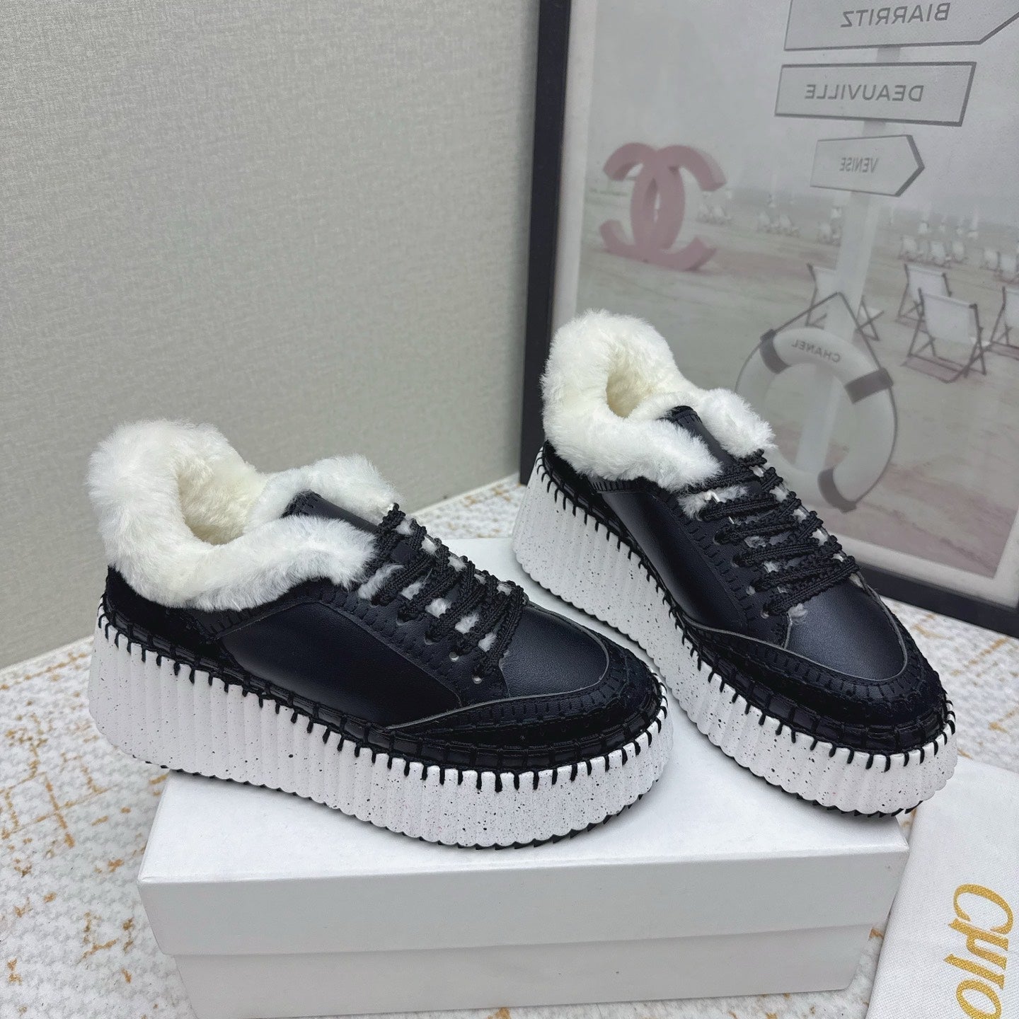 CHLOÉ 26S WEDGE SOLE SNEAKERS IN BLACK CALFSKIN