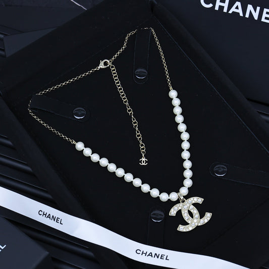 25P PEARL NECKLACE IN LIGHT GOLD STAR & HEART DOUBLE C PENDANT