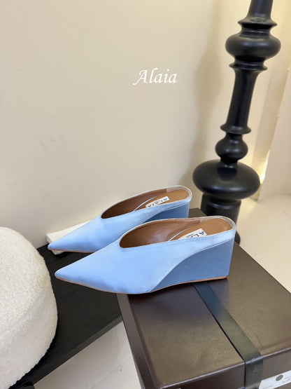 ALAIA HIGH MULES 25S IN LIGHT BLUE SATIN
