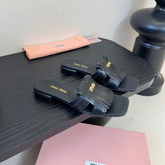 MIUMIU 26S FLAT SLIPPERS IN BLACK CALFSKIN