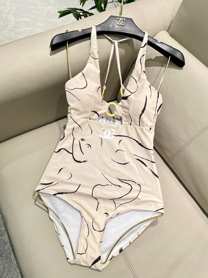 CC BIKINI SWIMSUIT SET IN CREAMY WHITE MIXED WITH CURVED BLACK DETAIL 608919