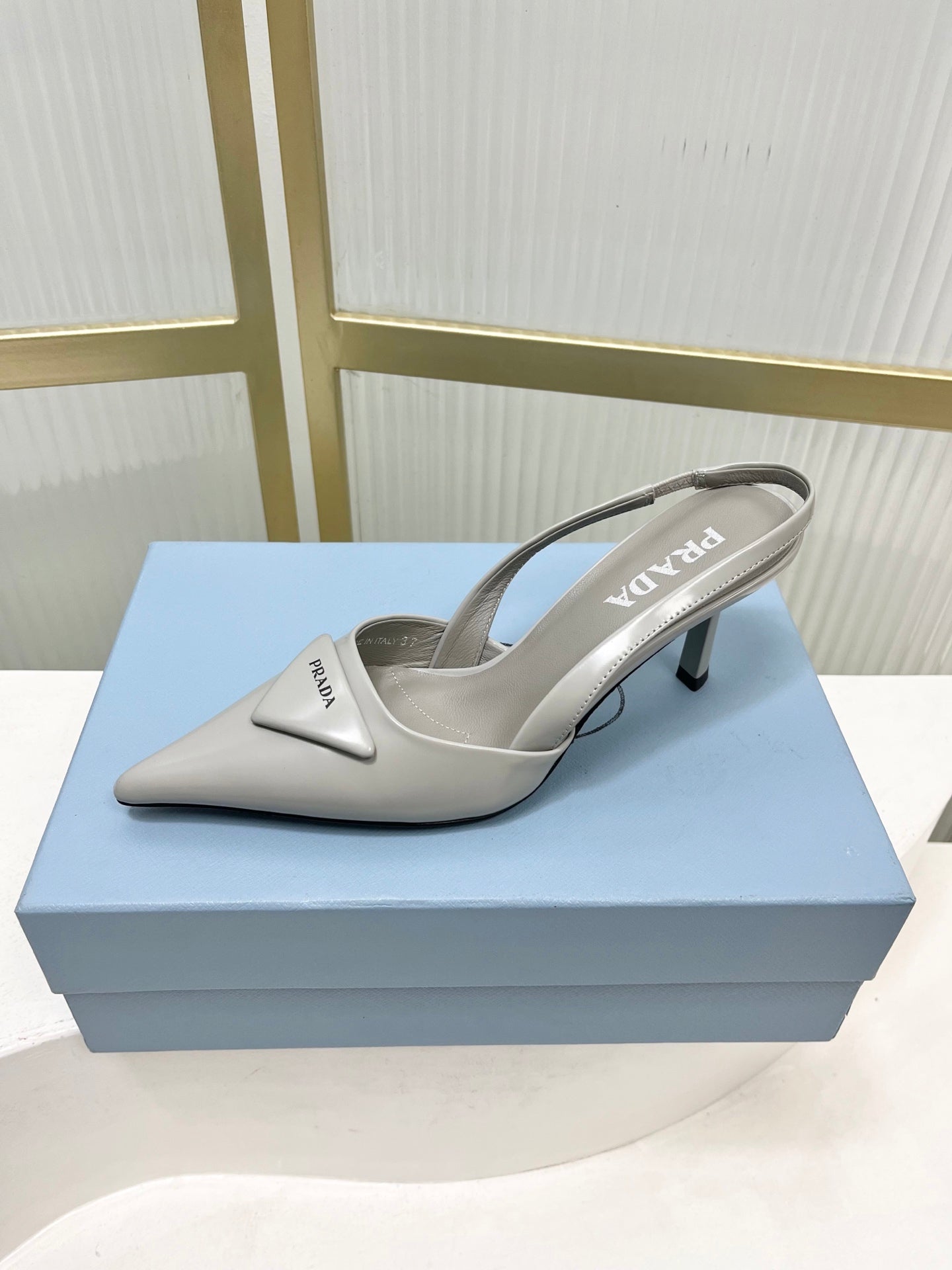 PRADA 26S SLINGBACK HIGH HEEL SANDALS 75MM IN LIGHT GRAY CALFSKIN WITH LOGO