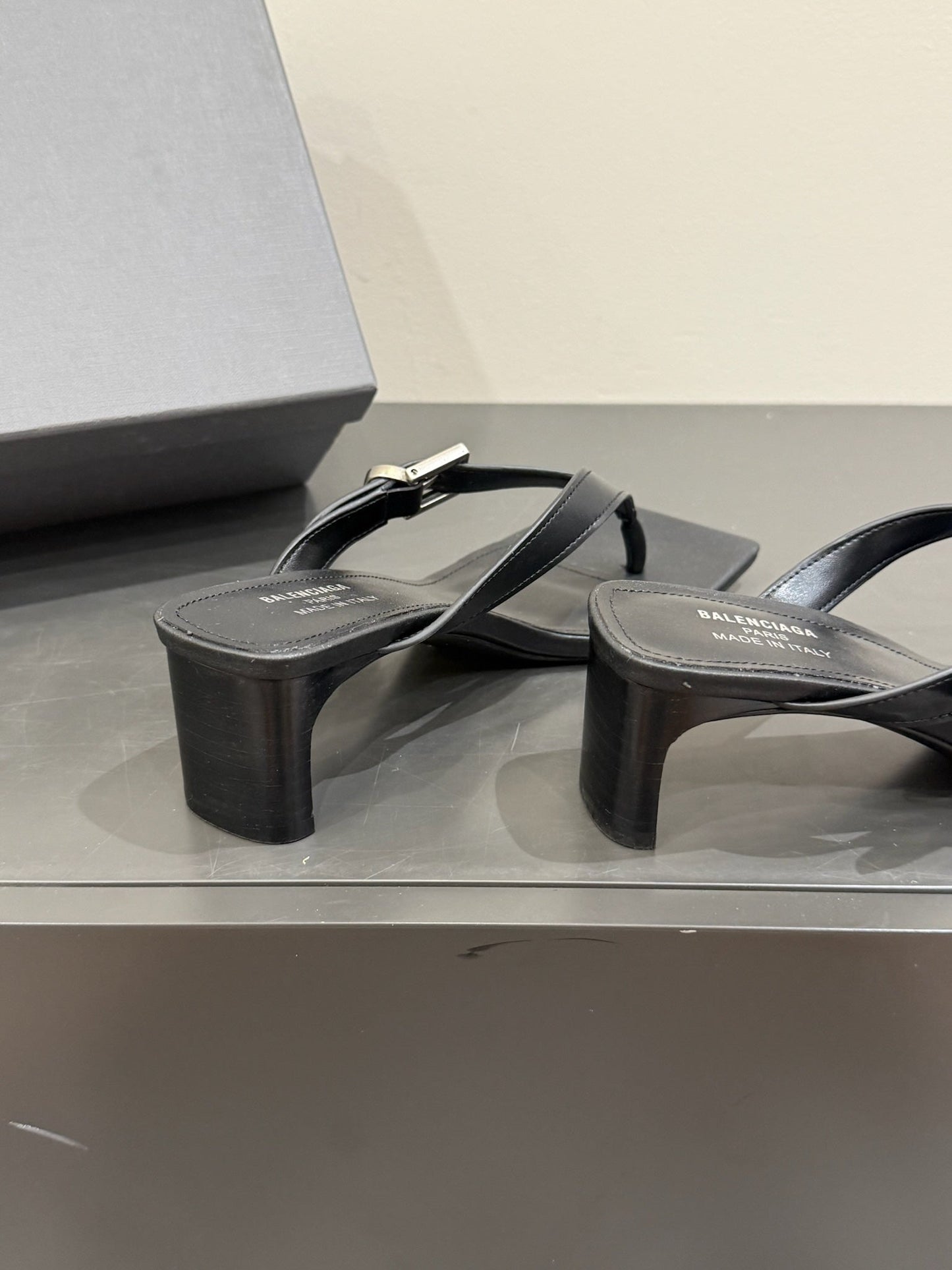 BALENCIAGA 25S HIGH-HEELED FLIP-FLOPS IN BLACK CALFSKIN WITH SILVER HARDWARE