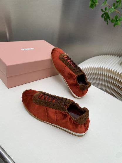 MIUMIU 26S SNEAKERS IN RUST RED PLUME SATIN