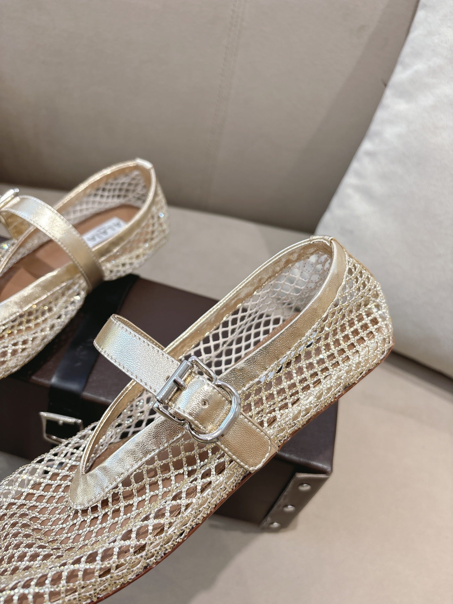 ALAIA 26S MESH FLATS IN LIGHT GOLD LAMBSKIN