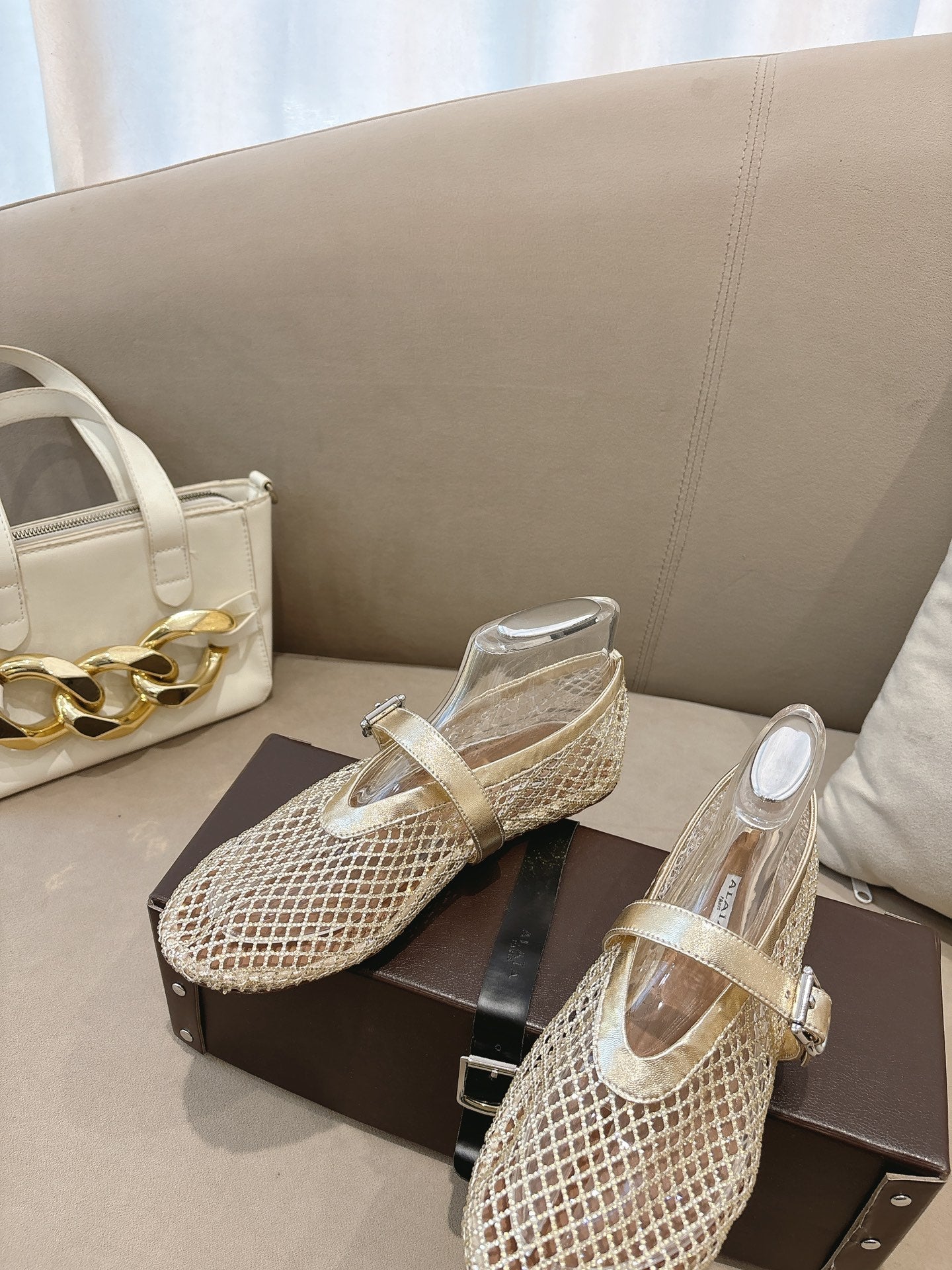 ALAIA 26S MESH FLATS IN LIGHT GOLD LAMBSKIN