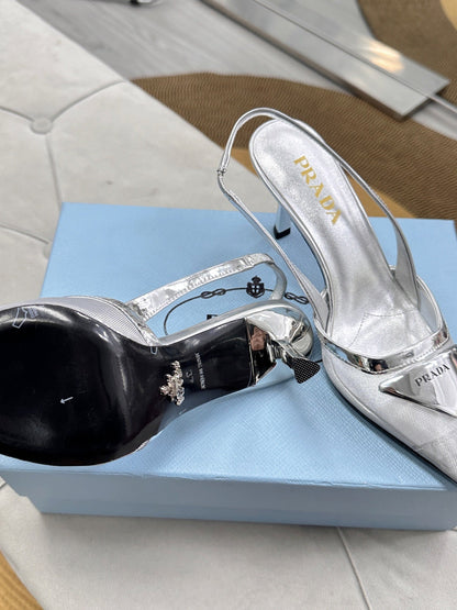 PRADA 25S TRIANGLE LOGO SLINGBACK PUMPS IN SILVER MESH FABRIC