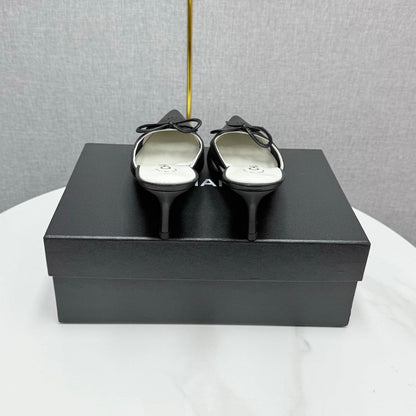 CC HEEL MULES 25S IN BLACK MESH FABRIC AND LAMBSKIN WITH BOW