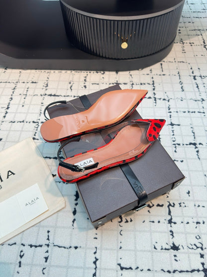 ALAIA FLAT SLINGBACK IN CHERRY RED PATENT CALFSKIN AND FILM
