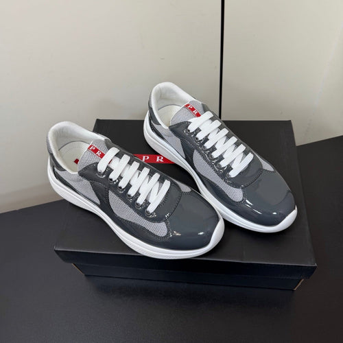 PRADA 26S SNEAKERS IN GRAY PATENT CALFSKIN AND WHITE MESH