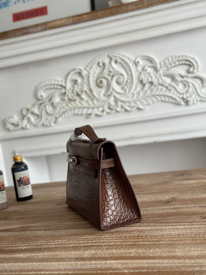 HM 26S KELLY MINI 22MM IN DARK BROWN CROC EMBOSSED CALFSKIN SILVER KELLY BUCKLE