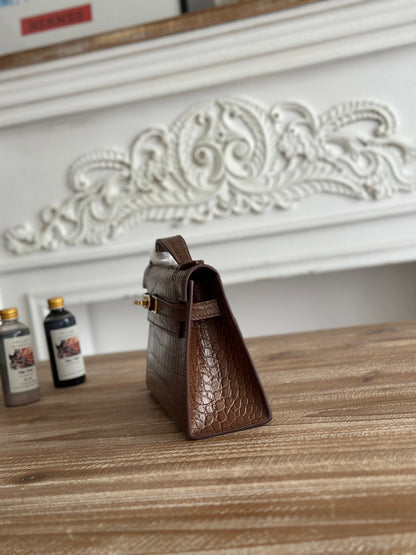 HM 26S KELLY MINI 22MM IN DARK BROWN CROC EMBOSSED CALFSKIN GOLD KELLY BUCKLE