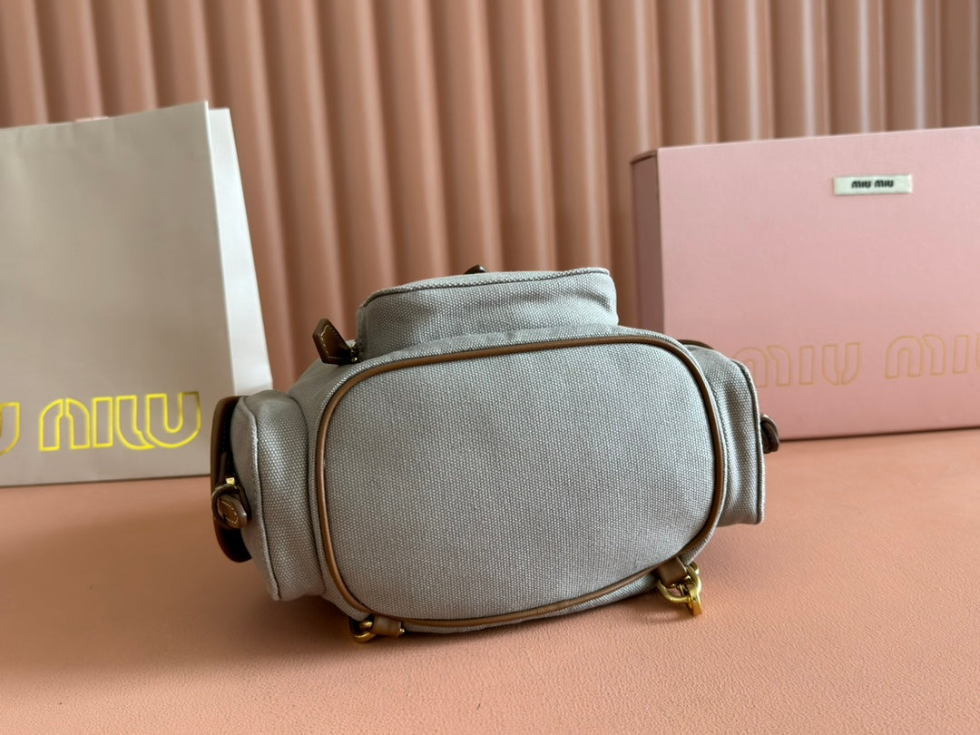 BACKPACK 22 IN GREY CANVAS BROWN CALFSKIN