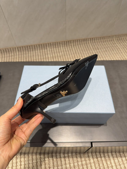 PRADA 26S POINTED TOE CUT OUT HIGH HEELS 75MM IN BLACK CALFSKIN WITH BOW