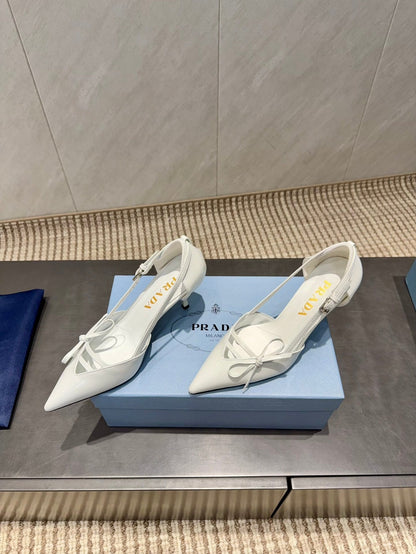 PRADA 26S POINTED TOE CUT OUT HIGH HEELS 75MM IN WHITE CALFSKIN WITH BOW