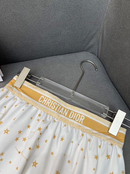 WHITE FLARED SKIRT WITH PRINT