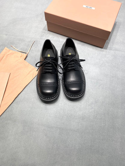 MIUMIU 26S LACE-UP LOAFERS IN BLACK SHINY CALFSKIN