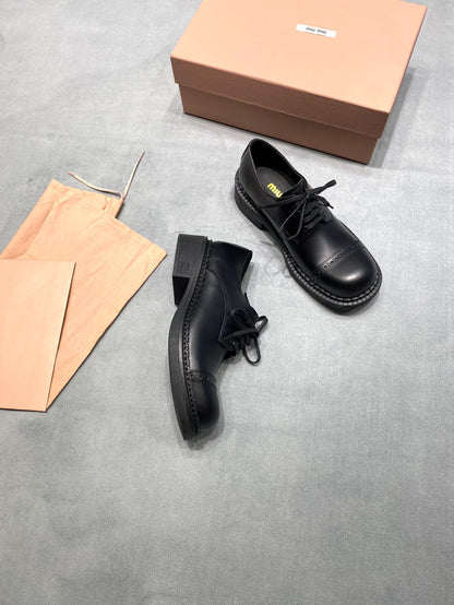 MIUMIU 26S LACE-UP LOAFERS IN BLACK SHINY CALFSKIN