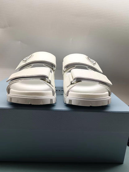 PRADA 26S STRAP SLIDES IN IVORY WHITE CROC EMBOSSED CALFSKIN
