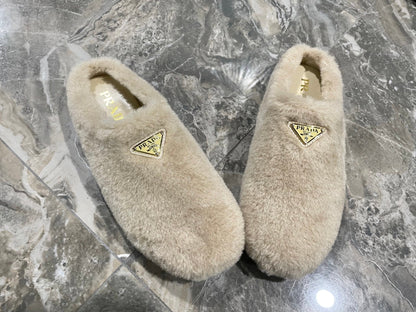 PRADA 26S SLIPPERS IN BEIGE WOOL