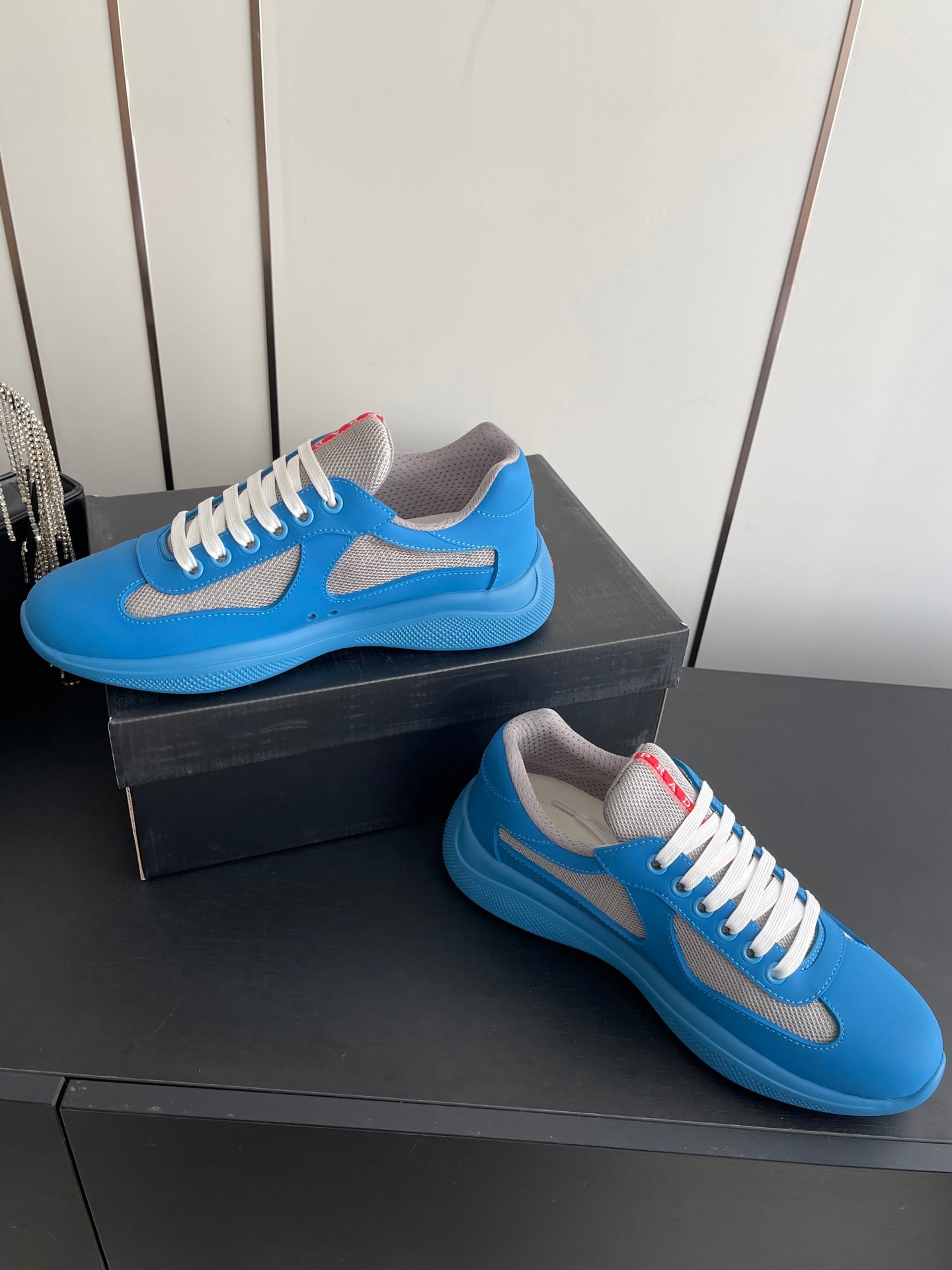 PRADA 26S AMERICA CUP SNEAKERS IN AZURE BLUE SOFT RUBBER AND BIKE FABRIC