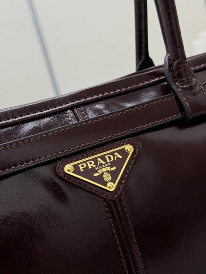PRADA 25S BONNIE LARGE HANDBAG 38 IN BURGUNDY GLOSSY CALFSKIN GOLD HARDWARE