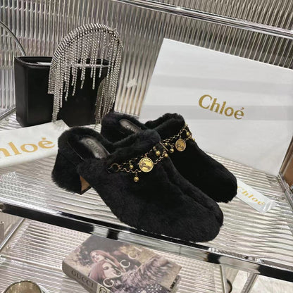 CHLOÉ 26S HIGH-HEELED MULES IN BLACK WOOL