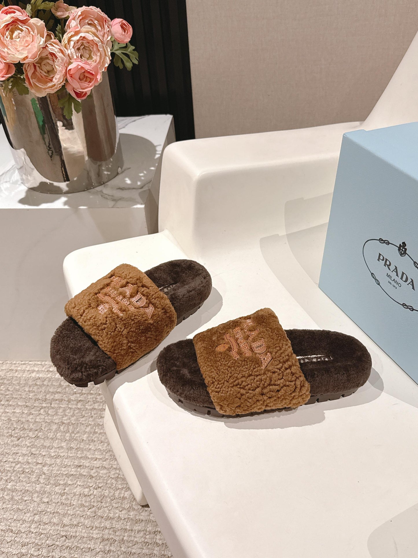 PRADA 25S FLAT MULES IN DARK BROWN RABBIT FUR