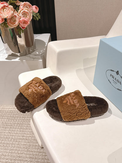 PRADA 25S FLAT MULES IN DARK BROWN RABBIT FUR