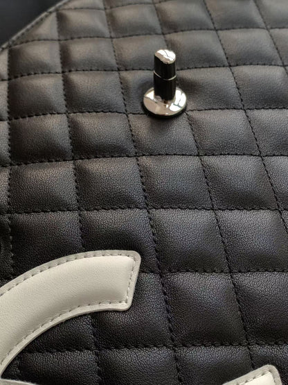 CHANEL CAMBON LARGE FLAP 25S 33 CM IN BLACK CALFSKIN WITH WHITE LOGO