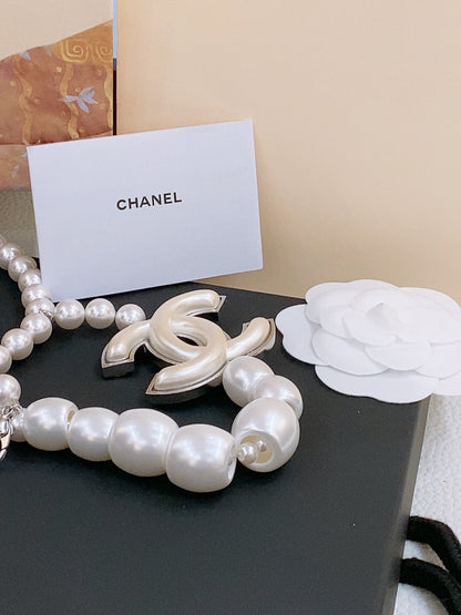 CHAIN BELT IN PEARL AND SILVER METAL