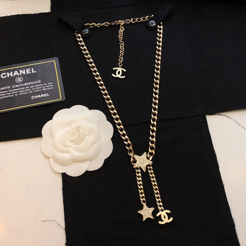 CHANEL 26S CHANEL CC LOGO DOUBLE CHAIN STAR DROP NECKLACE IN GOLD METAL 633324