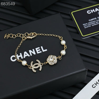CC BRACELET 25P IN GOLD METAL PEARLY WHITE AND CRYSTAL
